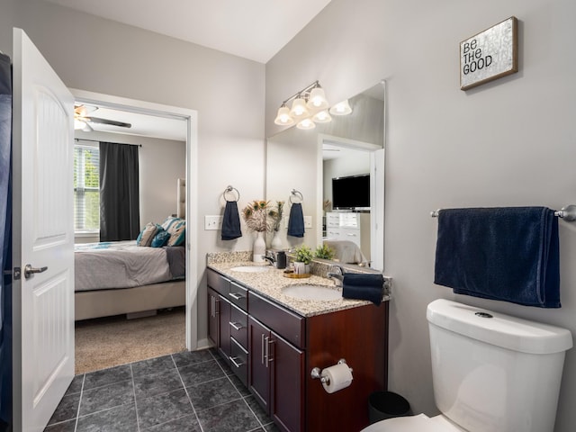 1118 Litton Ave Unit 218, Nashville, TN 37216 - bathroom featuring ensuite bath, double vanity, toilet, and a ceiling fan