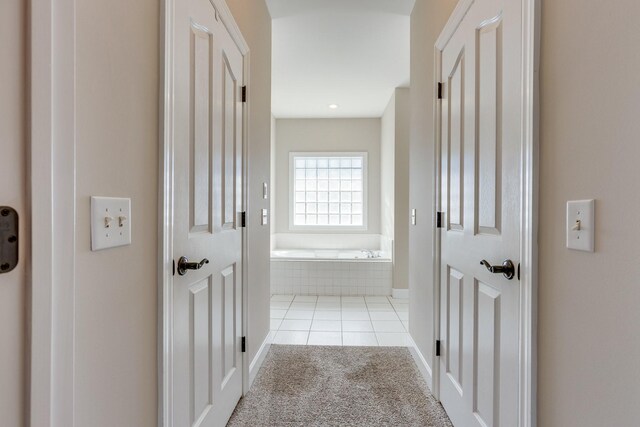 1410 Wall St, Murfreesboro, TN 37130 - corridor featuring tile patterned floors, baseboards, and carpet flooring