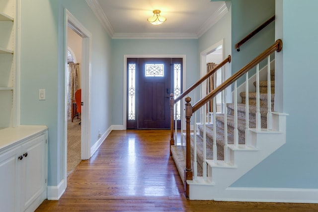 1410 Wall St, Murfreesboro, TN 37130 - entrance foyer featuring stairs, ornamental molding, wood finished floors, and baseboards