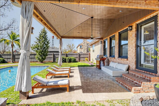 1410 Wall St, Murfreesboro, TN 37130 - fenced backyard with entry steps, ceiling fan, grilling area, and a patio area