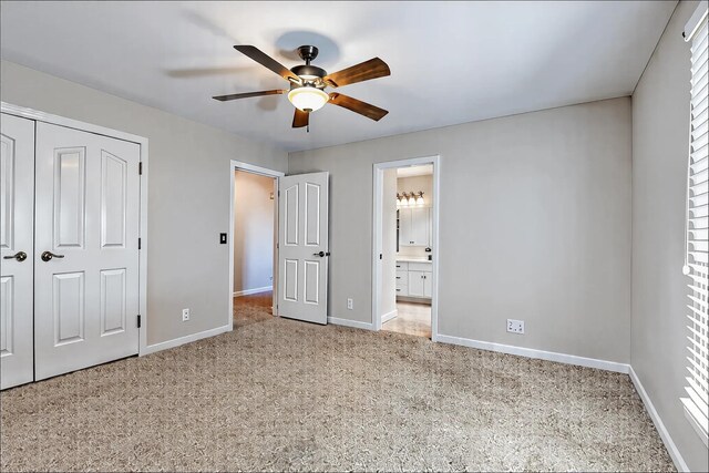 1410 Wall St, Murfreesboro, TN 37130 - unfurnished bedroom with carpet flooring, baseboards, a closet, connected bathroom, and ceiling fan