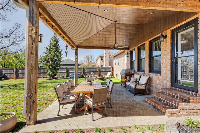 1410 Wall St, Murfreesboro, TN 37130 - view of patio featuring ceiling fan, outdoor dining space, entry steps, and area for grilling