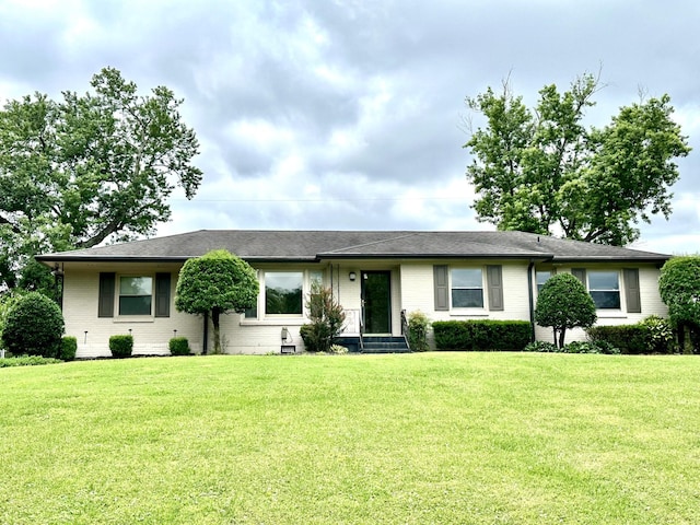 2451 Cabin Hill Rd, Nashville, TN 37214 - ranch-style home with a front lawn, brick siding, and a shingled roof