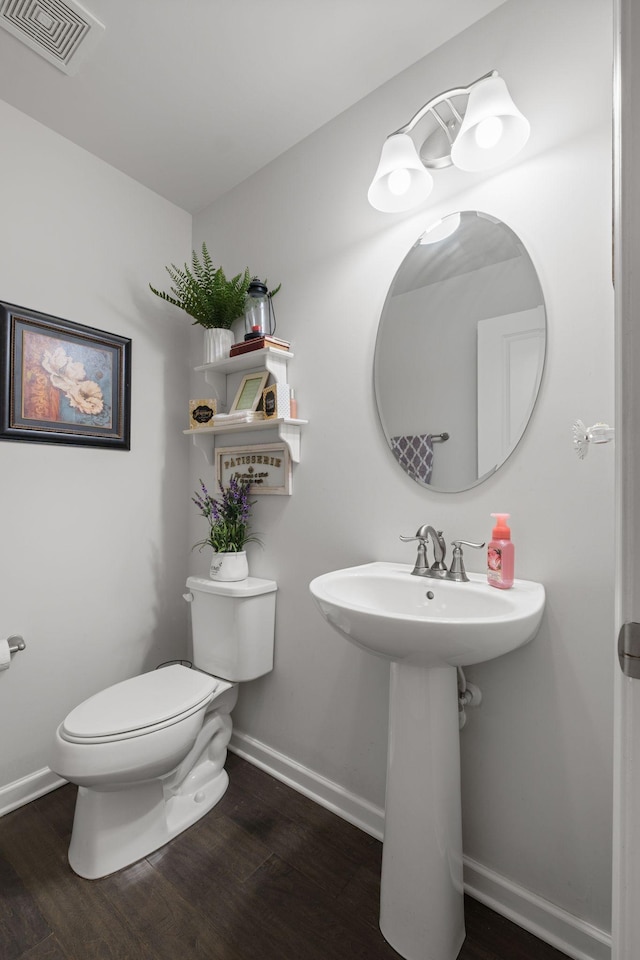 108 Rotondi Ct, Gallatin, TN 37066 - bathroom with wood finished floors, toilet, baseboards, and a sink