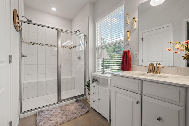 108 Rotondi Ct, Gallatin, TN 37066 - bathroom with plenty of natural light, a shower stall, vanity, and recessed lighting
