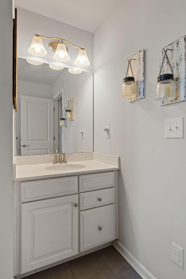 108 Rotondi Ct, Gallatin, TN 37066 - bathroom with vanity, baseboards, and tile patterned flooring
