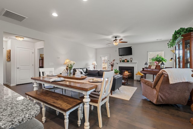 108 Rotondi Ct, Gallatin, TN 37066 - dining space featuring ceiling fan, healthy amount of natural light, a warm lit fireplace, recessed lighting, and dark wood-type flooring