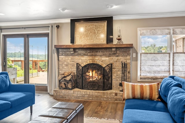 2797 Lewis Rd, Santa Fe, TN 38482 - living room featuring wood finished floors, a brick fireplace, and ornamental molding