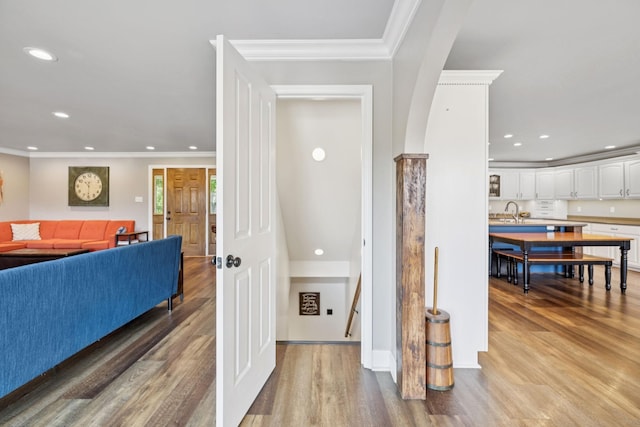 2797 Lewis Rd, Santa Fe, TN 38482 - hallway featuring light wood-type flooring, recessed lighting, crown molding, a sink, and baseboards