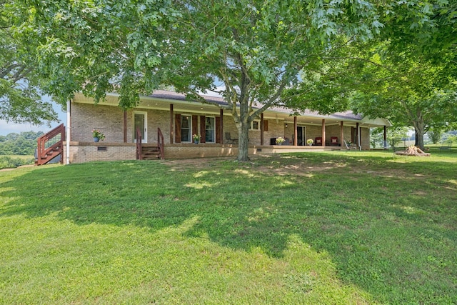 2797 Lewis Rd, Santa Fe, TN 38482 - back of property featuring a yard and brick siding