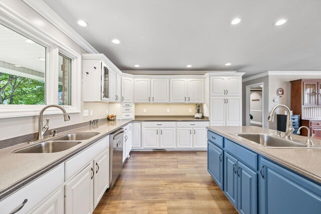 2797 Lewis Rd, Santa Fe, TN 38482 - kitchen with a sink, blue cabinets, recessed lighting, white cabinetry, and crown molding