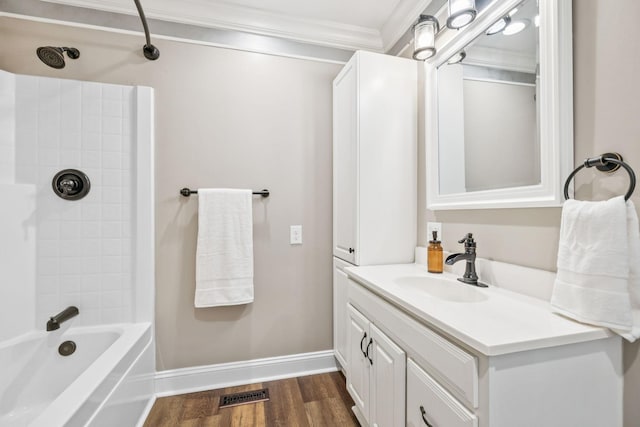 2797 Lewis Rd, Santa Fe, TN 38482 - full bath featuring crown molding, vanity, wood finished floors, baseboards, and shower / washtub combination
