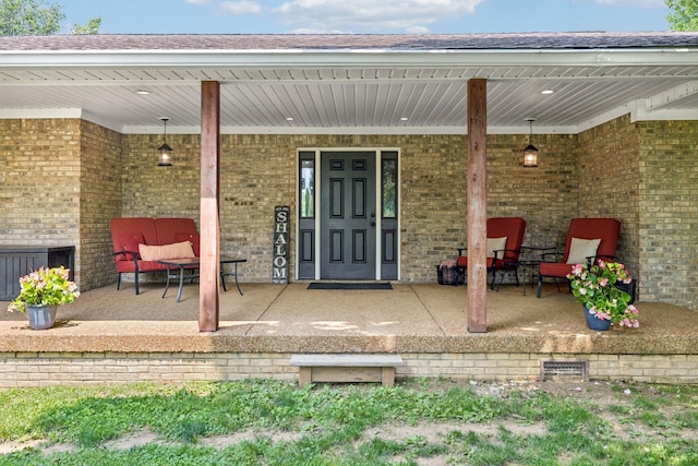 2797 Lewis Rd, Santa Fe, TN 38482 - property entrance featuring covered porch and brick siding