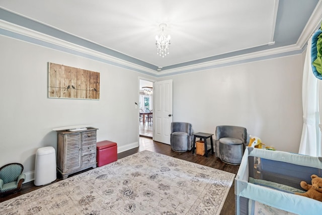 2797 Lewis Rd, Santa Fe, TN 38482 - bedroom with a chandelier, wood finished floors, a raised ceiling, crown molding, and baseboards