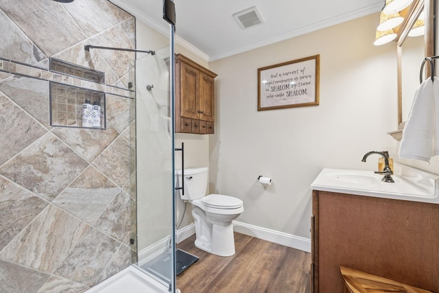 2797 Lewis Rd, Santa Fe, TN 38482 - bathroom with vanity, toilet, wood finished floors, a shower stall, and ornamental molding