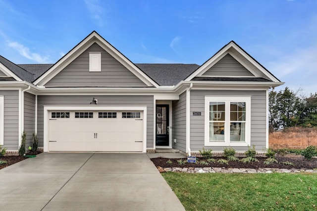 35 Audubon Ln, Murfreesboro, TN 37128 - view of front of property with concrete driveway, an attached garage, and a shingled roof