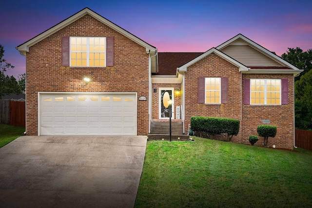 3129 Brook Hill Dr, Clarksville, TN 37042 - traditional-style home with concrete driveway, brick siding, and a garage