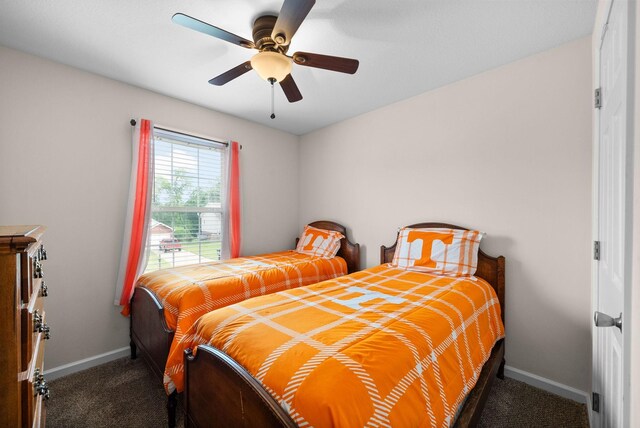 3129 Brook Hill Dr, Clarksville, TN 37042 - carpeted bedroom with baseboards and ceiling fan