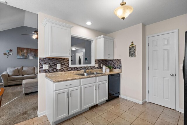3129 Brook Hill Dr, Clarksville, TN 37042 - kitchen featuring black appliances, a sink, light tile patterned flooring, decorative backsplash, and white cabinets