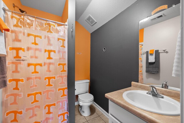 3129 Brook Hill Dr, Clarksville, TN 37042 - full bathroom with vanity, toilet, tile patterned flooring, a textured ceiling, and a shower with shower curtain