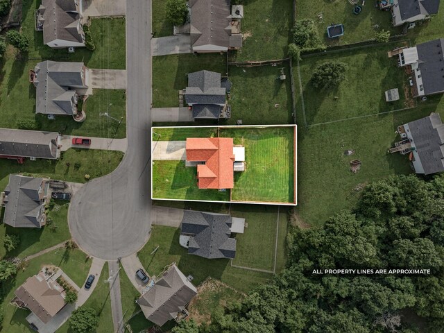 3129 Brook Hill Dr, Clarksville, TN 37042 - aerial view of property and surrounding area featuring nearby suburban area and property parcel outlined