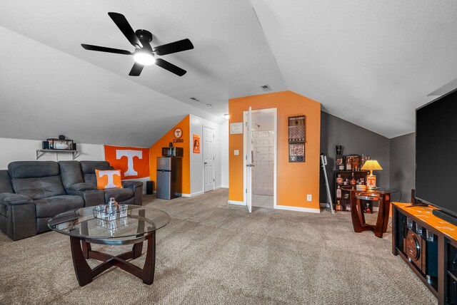 3129 Brook Hill Dr, Clarksville, TN 37042 - carpeted living area with ceiling fan, lofted ceiling, and baseboards