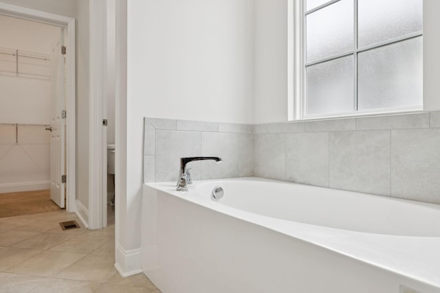 105 Artie Lee Ln, Nolensville, TN 37135 - full bath with a spacious closet, a garden tub, and tile patterned flooring