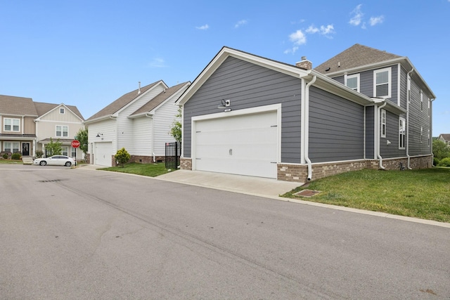105 Artie Lee Ln, Nolensville, TN 37135 - view of front of house with a front yard, a chimney, and an attached garage