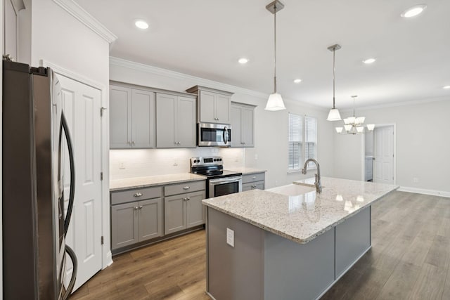 105 Artie Lee Ln, Nolensville, TN 37135 - kitchen with appliances with stainless steel finishes, gray cabinetry, a sink, tasteful backsplash, and crown molding