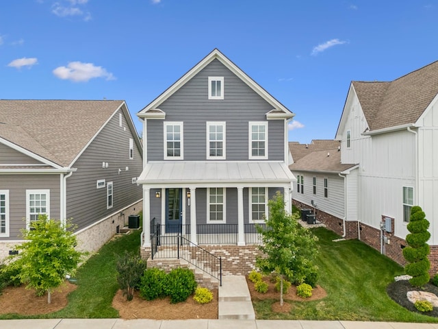 105 Artie Lee Ln, Nolensville, TN 37135 - view of front of property with a porch, a front yard, a standing seam roof, central AC unit, and metal roof