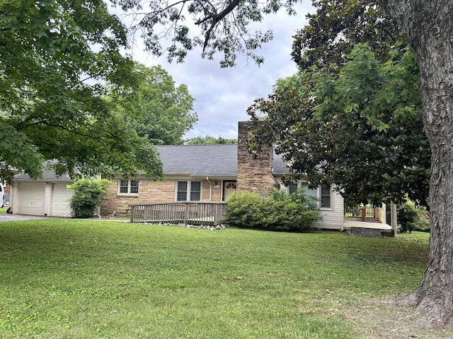 1102 Manor Rd, Columbia, TN 38401 - view of front of property featuring a chimney, a front lawn, and a wooden deck