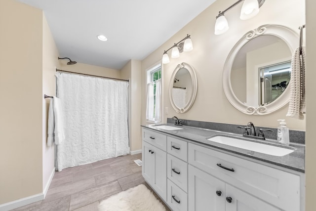 2034 Glencoe Rd, Culleoka, TN 38451 - full bathroom featuring double vanity, a shower with curtain, and recessed lighting
