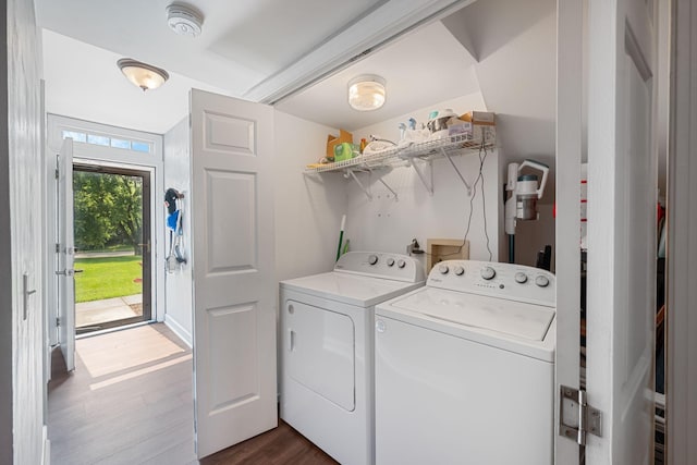 5025 Hillsboro Pike Unit 1A, Nashville, TN 37215 - laundry area with washing machine and dryer and dark wood finished floors