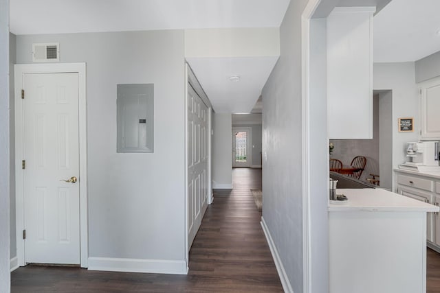 5025 Hillsboro Pike Unit 1A, Nashville, TN 37215 - hallway with electric panel, dark wood-type flooring, and baseboards