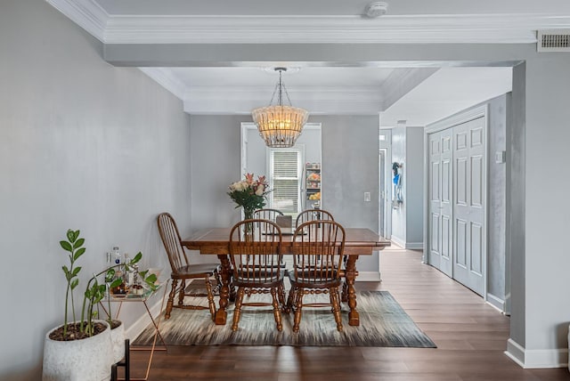 5025 Hillsboro Pike Unit 1A, Nashville, TN 37215 - dining area featuring a chandelier, wood finished floors, baseboards, and ornamental molding