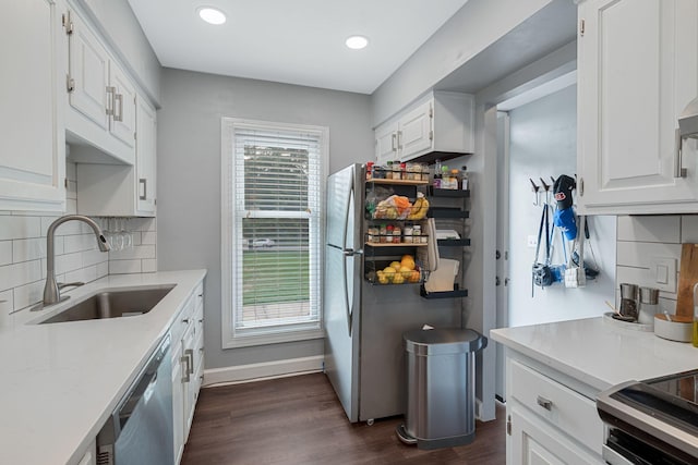 5025 Hillsboro Pike Unit 1A, Nashville, TN 37215 - kitchen featuring a sink, dishwasher, dark wood-style floors, freestanding refrigerator, and white cabinets