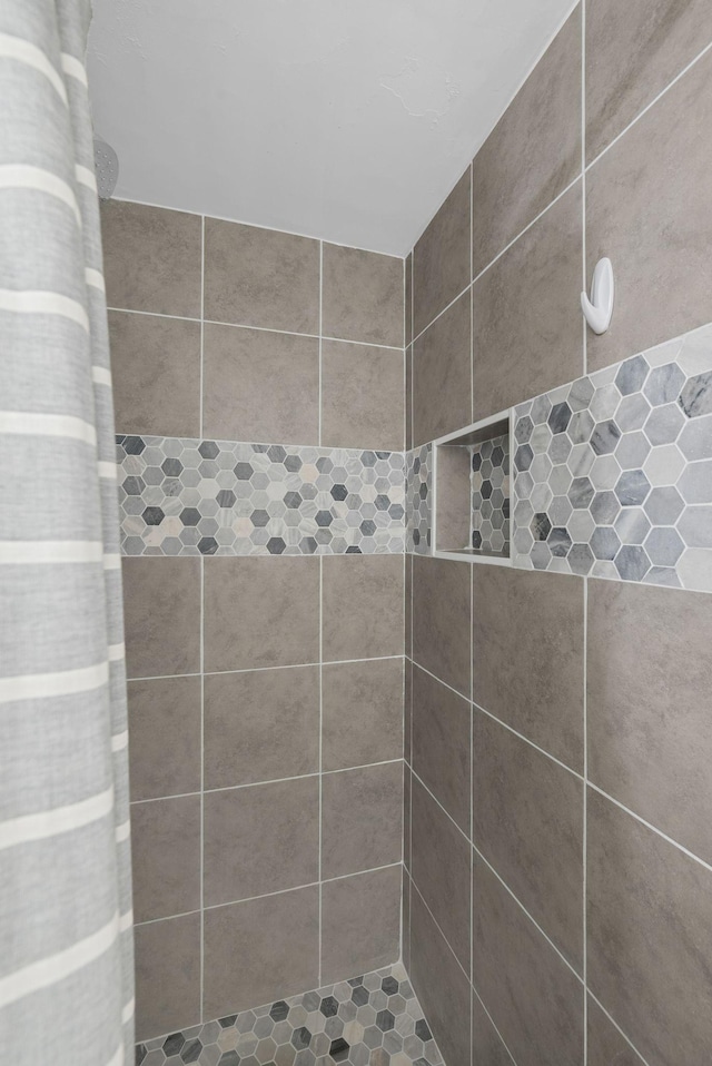 5025 Hillsboro Pike Unit 1A, Nashville, TN 37215 - bathroom featuring a tile shower