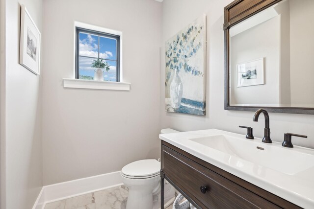 7433 Magnolia Valley Dr, Eagleville, TN 37060 - bathroom with marble look tiles, vanity, toilet, and baseboards
