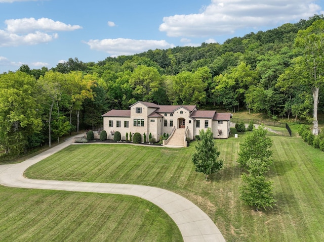7433 Magnolia Valley Dr, Eagleville, TN 37060 - aerial view of property and surrounding area with a heavily wooded area
