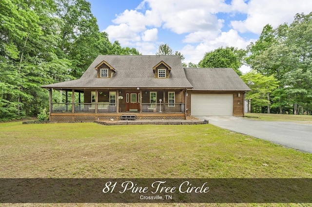 81 Pine Tree Cir, Crossville, TN 38571 - view of front of home featuring covered porch, a garage, driveway, and a front yard
