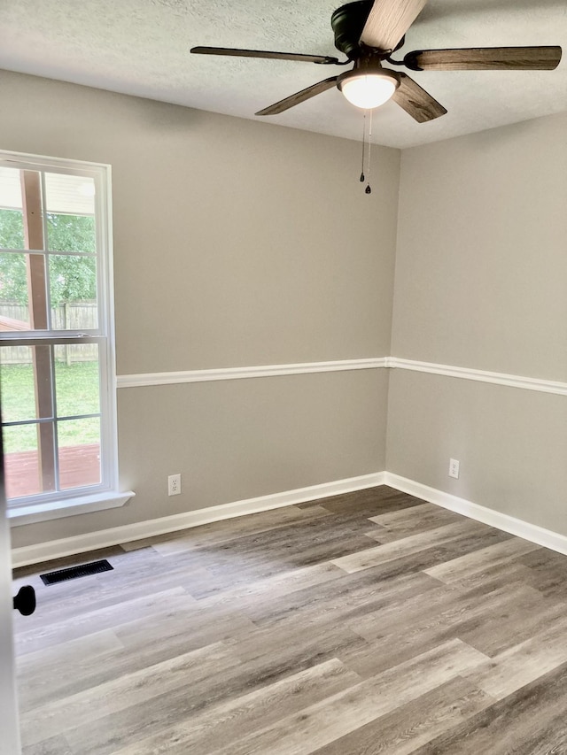 143 Mason St, Portland, TN 37148 - unfurnished room featuring ceiling fan, wood finished floors, and baseboards