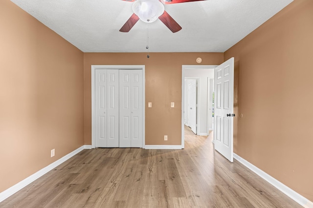 3540 Lake Towne Dr, Antioch, TN 37013 - unfurnished bedroom featuring light wood-type flooring, baseboards, a closet, and ceiling fan