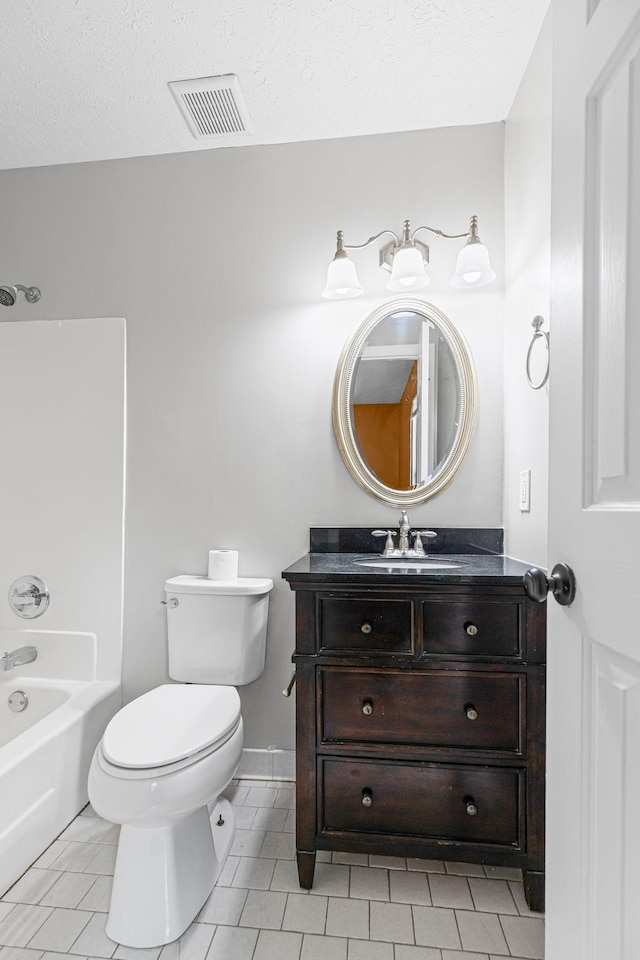 3540 Lake Towne Dr, Antioch, TN 37013 - full bath featuring vanity, toilet, tile patterned floors, tub / shower combination, and a textured ceiling