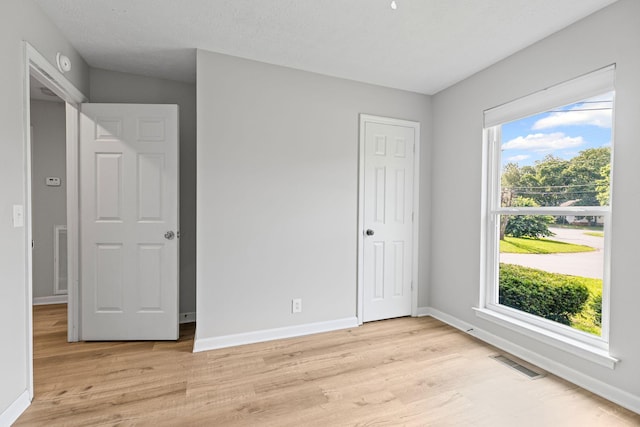 3540 Lake Towne Dr, Antioch, TN 37013 - unfurnished bedroom with light wood-style floors and baseboards