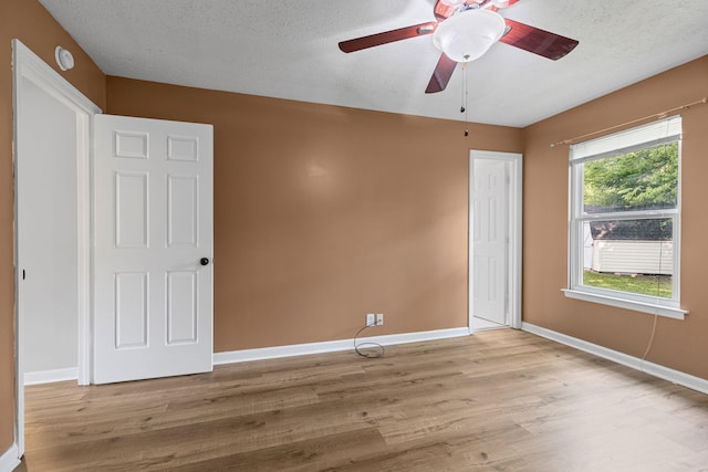 3540 Lake Towne Dr, Antioch, TN 37013 - empty room with wood finished floors, baseboards, ceiling fan, a textured ceiling, and a smoke detector
