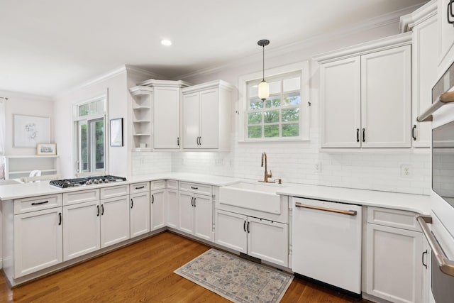 200 Addison Ave, Franklin, TN 37064 - kitchen with dishwasher, a sink, crown molding, stainless steel gas cooktop, and open shelves