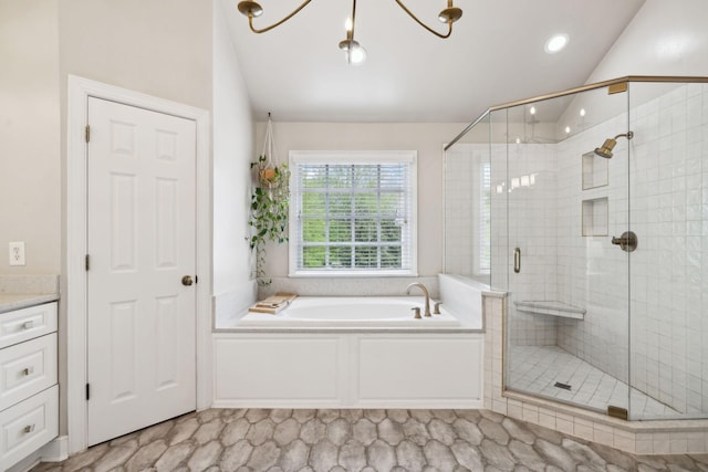 200 Addison Ave, Franklin, TN 37064 - bathroom featuring vaulted ceiling, a bath, a shower stall, vanity, and recessed lighting