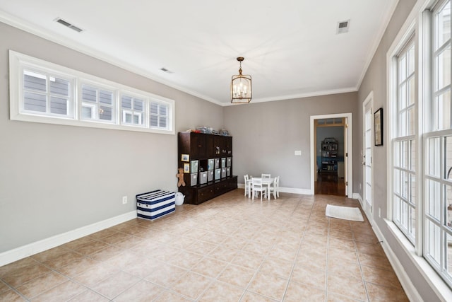 200 Addison Ave, Franklin, TN 37064 - spare room with a chandelier, healthy amount of natural light, ornamental molding, light tile patterned floors, and baseboards
