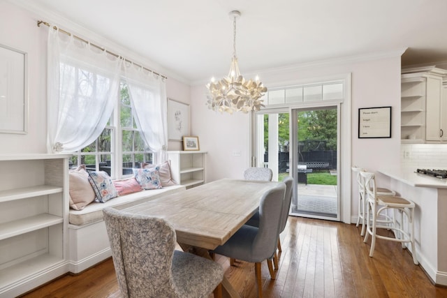 200 Addison Ave, Franklin, TN 37064 - dining room with a chandelier, wood-type flooring, and ornamental molding