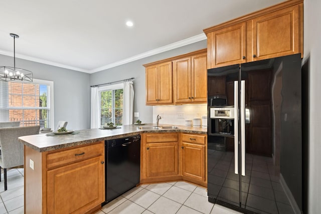5239 Starnes Dr, Murfreesboro, TN 37128 - kitchen with black appliances, a sink, a peninsula, light tile patterned floors, and a chandelier